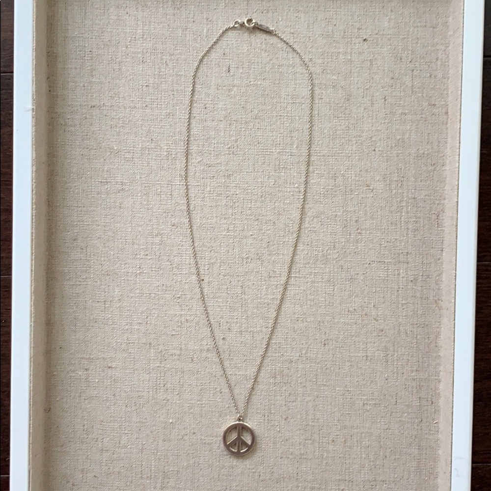 Tiffany & Co peace sign pendant